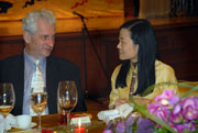 Ms Rebecca LI, Chairman, Symposium Organizing Committee, chatting with Mr Daniel KAUFMANN from the World Bank Institute
