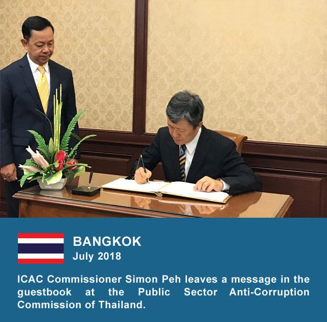 Bangkok July 2018, ICAC Commissioner Simon Peh leaves a message in the guestbook at the Public Sector Anti-Corruption Commission of Thailand