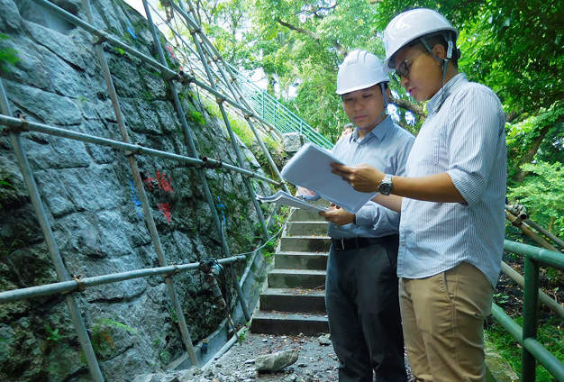 A CPD officer conducts a site visit for a government works project