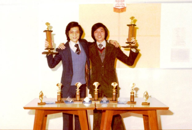 Mr Chu (right) partners with a colleague in a bridge competition for ICAC staff