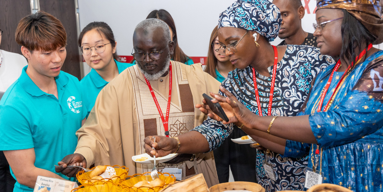 Students introduce to the officers of Senegal’s anti-corruption agency the local culture and delicacies