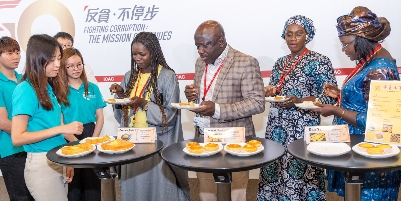 Students introduce to the officers of Senegal’s anti-corruption agency the local culture and delicacies